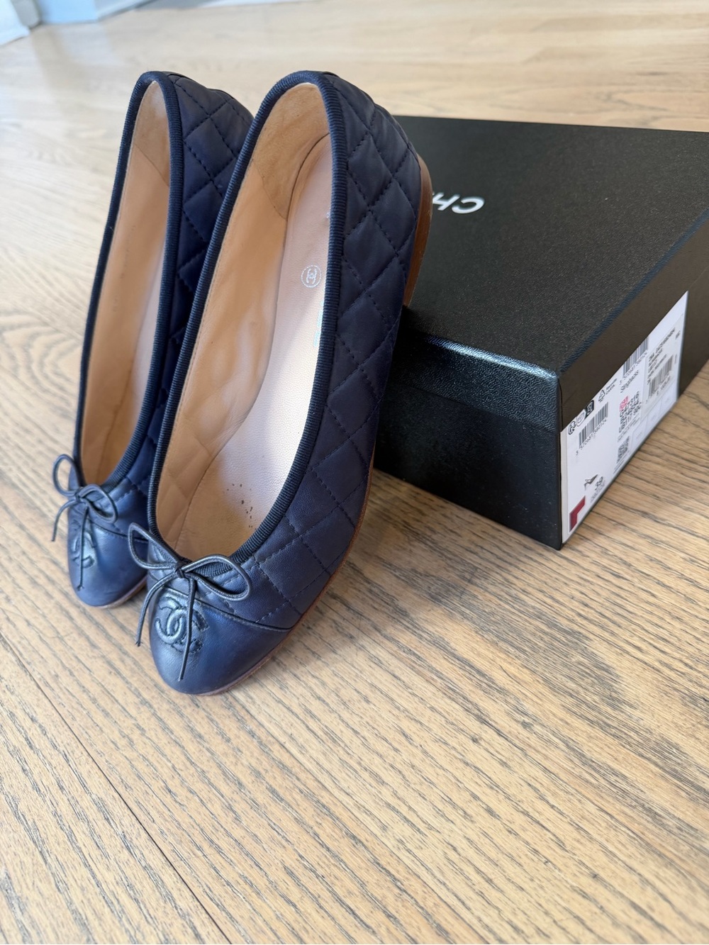 CHANEL Navy Quilted Leather Ballet Flats with Bow and CC Toe